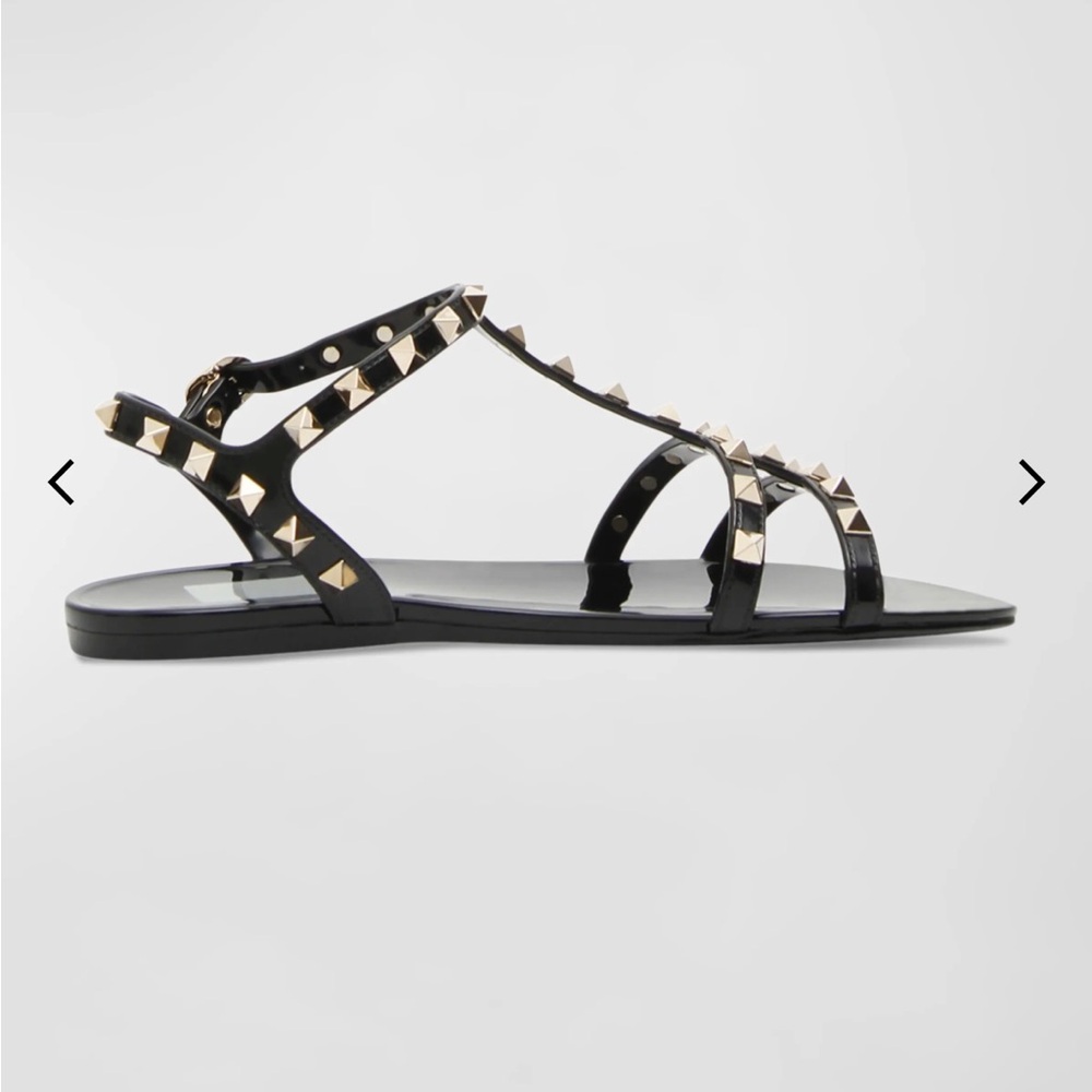 Valentino Garavani
Rockstud Jelly Flat Gladiator Sandals size 38